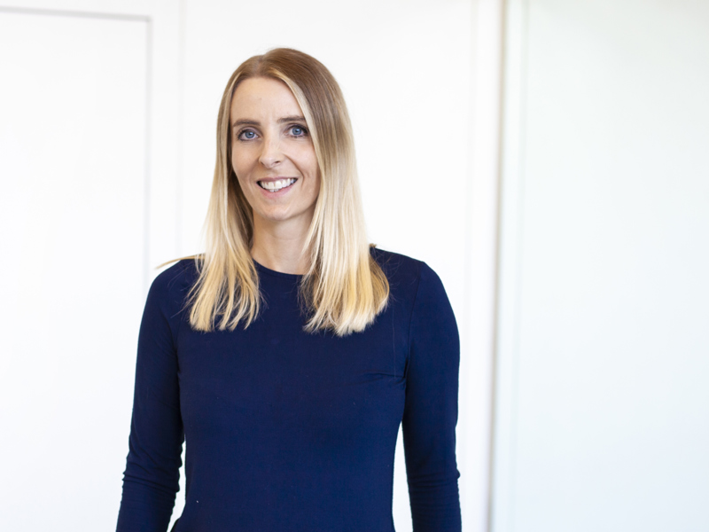 Headshot of Laura Nicholson. White female with long blonde hair wearing blue long sleeve tshirt Headshot of Laura Nicholson. White female with long blonde hair wearing blue long sleeve tshirt