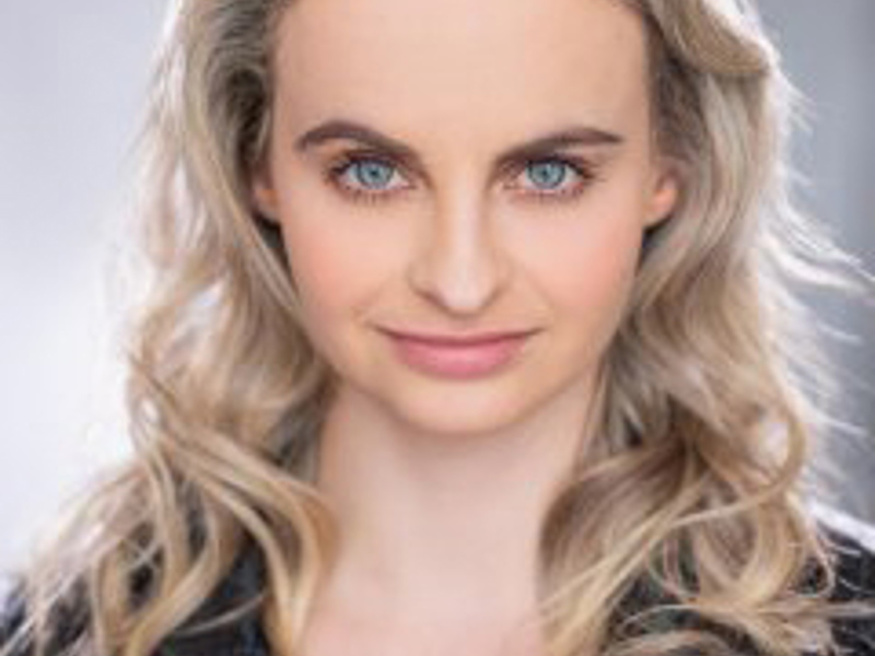 Headshot of Anita Mannings. white female with long curly blonde hair looking at the camera Headshot of Anita Mannings. white female with long curly blonde hair looking at the camera